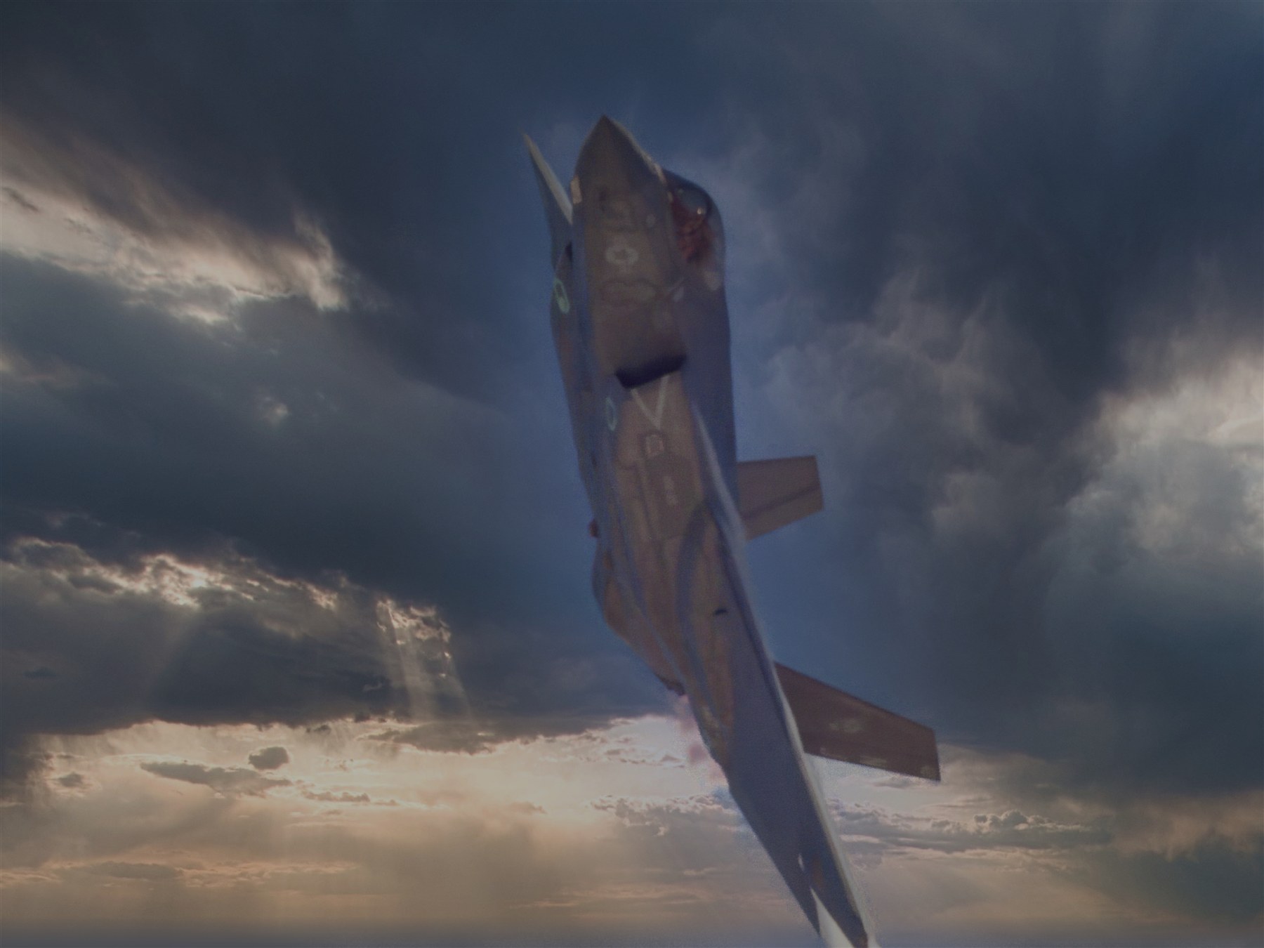 A fighter jet photographed on the ground.